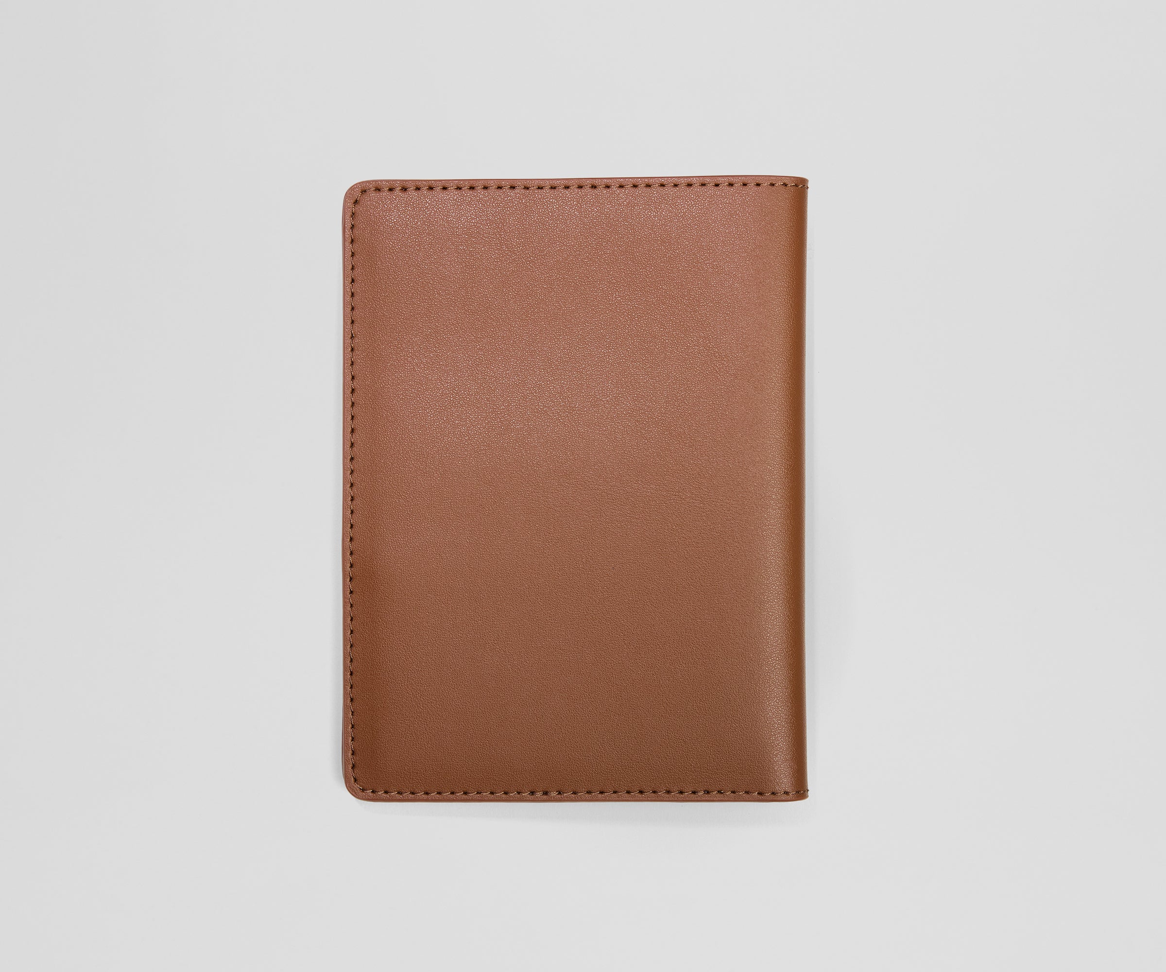 PDP_Holiday_PassportSleeve_SaddleBrown_02.jpg